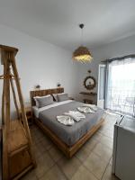 Posteľ alebo postele v izbe v ubytovaní Hotel Livadia