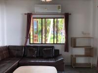 Posezení v ubytování Itsara bungalow