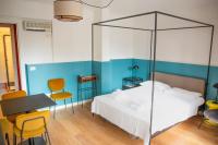A bed or beds in a room at La Donota