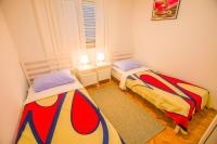 Posteľ alebo postele v izbe v ubytovaní Apartments Josip