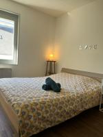 Posteľ alebo postele v izbe v ubytovaní Les appartements d’Edgar