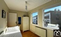 Łóżko lub łóżka w pokoju w obiekcie La Parisienne entre ville et port 6pers - stationnement