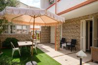 Patio lub wspólna przestrzeń na świeżym powietrzu w obiekcie Villa Piana