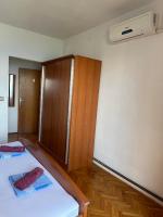 Postel nebo postele na pokoji v ubytování Apartments Šimić