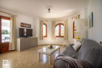 TV a/nebo společenská místnost v ubytování Villa Ausina by Abahana Villas