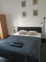 Posteľ alebo postele v izbe v ubytovaní Turul Apartment Budapest