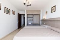 Postel nebo postele na pokoji v ubytování Rentalmar Bahia Palace