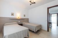 Postel nebo postele na pokoji v ubytování Rentalmar Bahia Palace