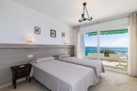 Postel nebo postele na pokoji v ubytování Rentalmar Bahia Palace