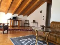 Televízia a/alebo spoločenská miestnosť v ubytovaní Casa Vela