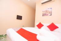 OYO 1224 Hotel Hajah Rohayahにあるベッド