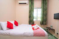 OYO 1224 Hotel Hajah Rohayahにあるベッド