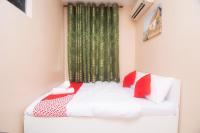 OYO 1224 Hotel Hajah Rohayahにあるベッド