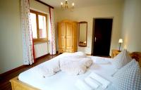 Posteľ alebo postele v izbe v ubytovaní Gstattlhof Mountain Farmhouse