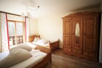 Posteľ alebo postele v izbe v ubytovaní Gstattlhof Mountain Farmhouse