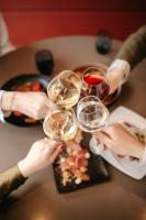 a group of people holding wine glasses on a table at Escale Oceania Brest in Gouesnou