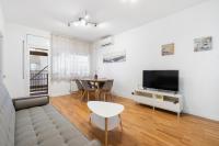 TV a/nebo společenská místnost v ubytování Plaza Espanya Apartment