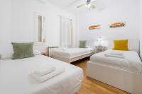 Postel nebo postele na pokoji v ubytování Plaza Espanya Apartment