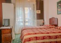 Posteľ alebo postele v izbe v ubytovaní Bridge Hotel