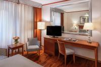 Televízia a/alebo spoločenská miestnosť v ubytovaní Starhotels Metropole