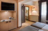 Posteľ alebo postele v izbe v ubytovaní Starhotels Metropole
