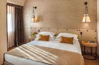 Posteľ alebo postele v izbe v ubytovaní Starhotels Metropole
