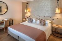 Posteľ alebo postele v izbe v ubytovaní Starhotels Metropole