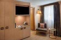 Televízia a/alebo spoločenská miestnosť v ubytovaní Starhotels Metropole