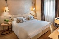 Posteľ alebo postele v izbe v ubytovaní Starhotels Metropole