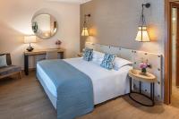 Posteľ alebo postele v izbe v ubytovaní Starhotels Metropole