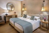 Posteľ alebo postele v izbe v ubytovaní Starhotels Metropole