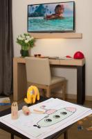 Televízia a/alebo spoločenská miestnosť v ubytovaní Starhotels Metropole