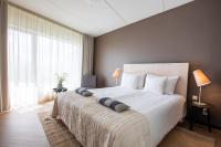 Postel nebo postele na pokoji v ubytování Hedon Spa & Hotel