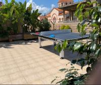 Stolný tenis v ubytovaní Baulus Yard Luxury alebo v jeho okolí
