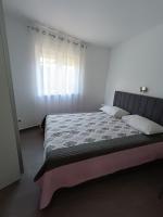 Postel nebo postele na pokoji v ubytování Apartment Kricin