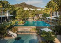 an aerial view of a pool at a resort at Stay Wellbeing & Lifestyle Resort in Rawai Beach