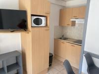 Kuchyňa alebo kuchynka v ubytovaní Résidence Graziella Appartement 210