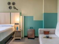 Postel nebo postele na pokoji v ubytování Ibis Styles Zaragoza Ramiro I