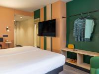 TV a/nebo společenská místnost v ubytování Ibis Styles Zaragoza Ramiro I