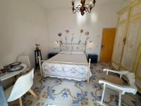 Posteľ alebo postele v izbe v ubytovaní Il Profumo dei Fiori