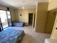 A bed or beds in a room at Il Melograno