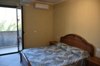 A bed or beds in a room at Il Melograno