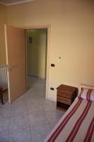 A bed or beds in a room at Il Melograno