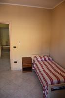 A bed or beds in a room at Il Melograno