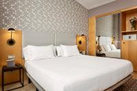 Posteľ alebo postele v izbe v ubytovaní Hotel Sercotel Portales