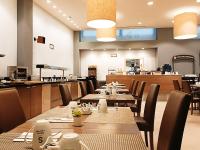 Reštaurácia alebo iné gastronomické zariadenie v ubytovaní Hotel Sercotel Portales