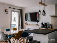 Televízia a/alebo spoločenská miestnosť v ubytovaní L'appartement de jeanne