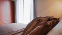 Postel nebo postele na pokoji v ubytování Bastasio House