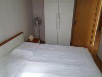 Posteľ alebo postele v izbe v ubytovaní Apartments Villa Maslinica