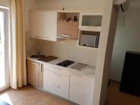 Kuchyňa alebo kuchynka v ubytovaní Apartments Villa Maslinica